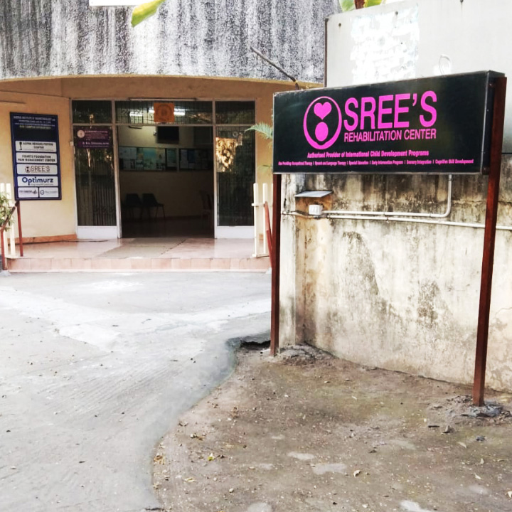 The image displays the signage of Sree's Rehabilitation Center located in Anna Nagar, Chennai.